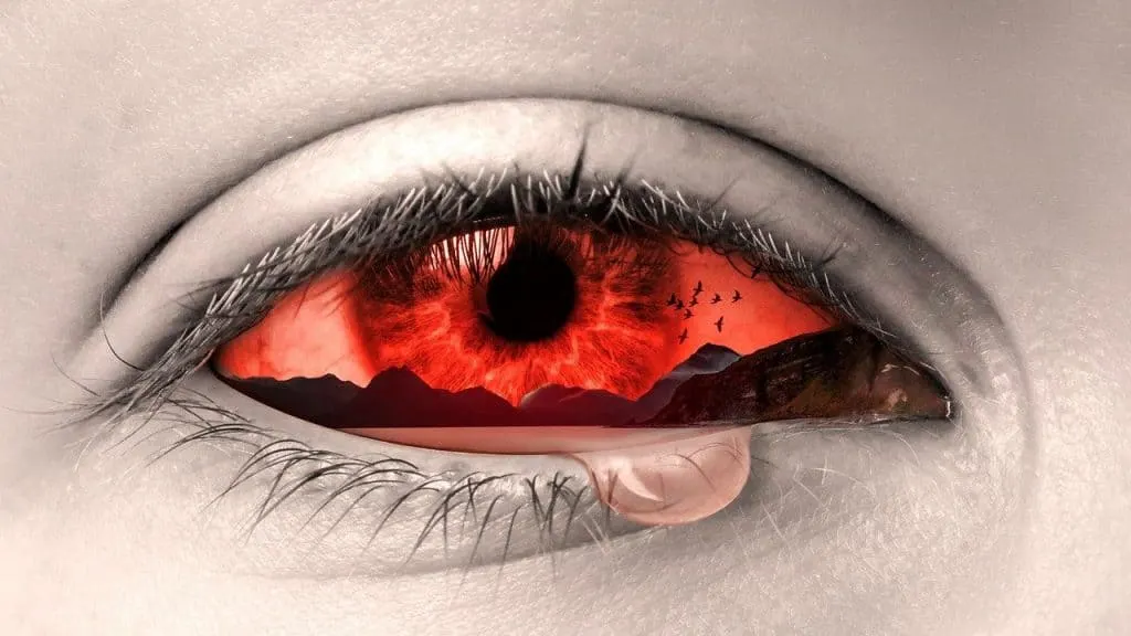 sad red eye with a tear