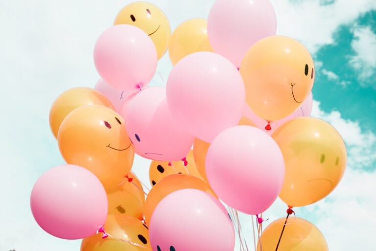 colored baloons with happy face
