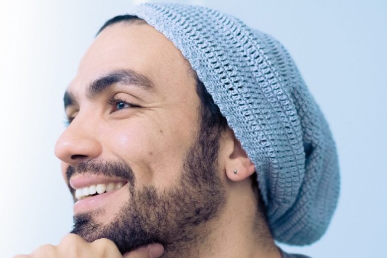 man with beard smiling