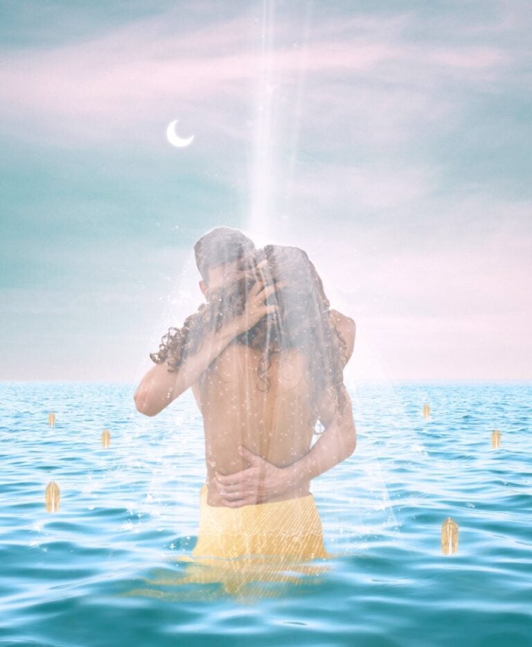twin flames hugging in the sea