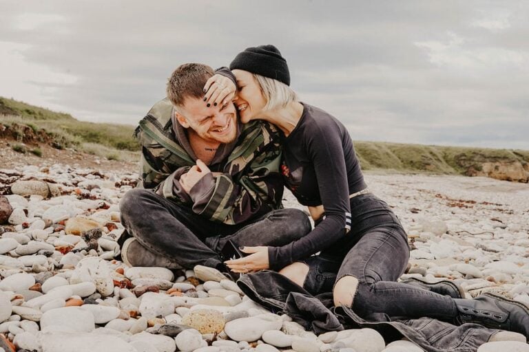 couple laughing and hugging in the nature