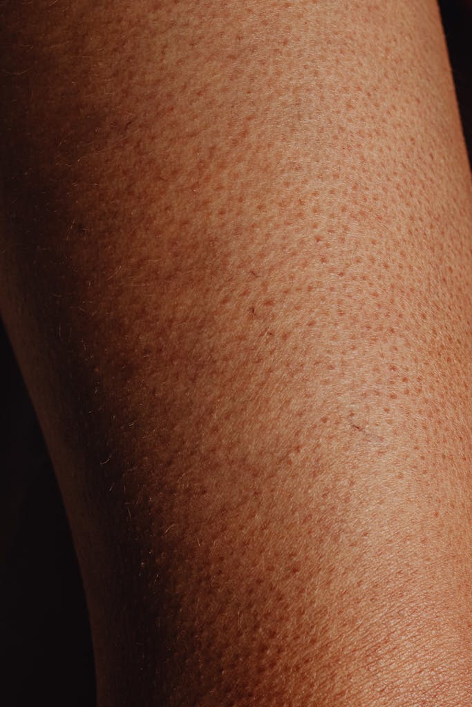 Detailed shot showcasing goosebumps and the texture and natural appearance of human skin.