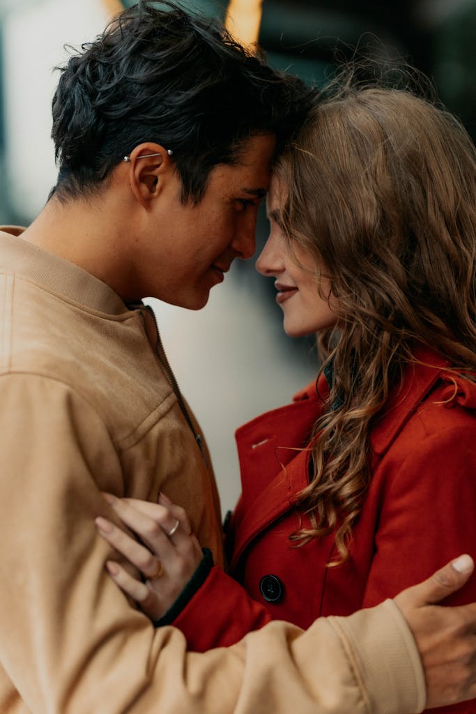 A couple shares a tender moment on the streets of Buenos Aires, Argentina.
